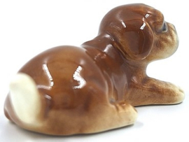 Liggende boxer puppy door Goebel