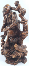 Houten wijsgeer met leerling