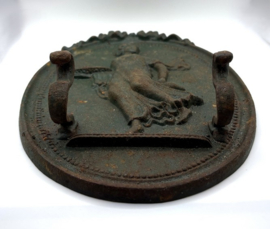 Groene, gietijzeren muurplaquette