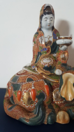 Japanse koro van dame op olifant