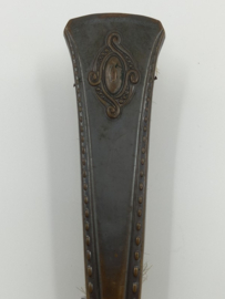 Art nouveau stoffer en blik
