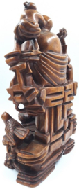 Houten wijsgeer met leerling