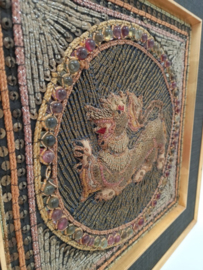 Textiel wanddecoratie van leeuw