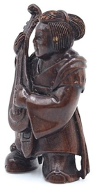 Netsuke van een muzikant
