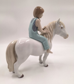 Lladro, meisje op pony #9139