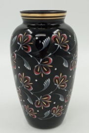 Zwarte vaas met floraal decor