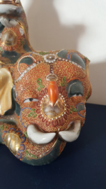 Japanse koro van dame op olifant