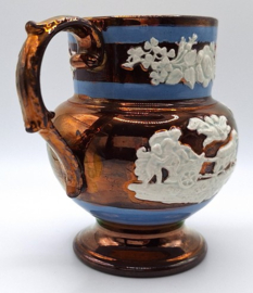 Lustreware schenkkan met floraar decor
