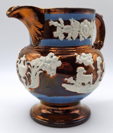 Lustreware schenkkan met floraar decor
