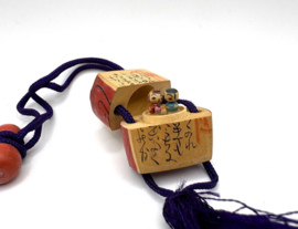 Japanse inro met kokeshi