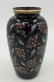 Zwarte vaas met floraal decor