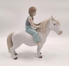 Lladro, meisje op pony #9139