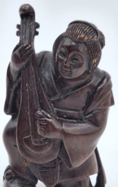 Netsuke van een muzikant
