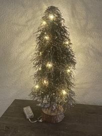 kerstboom van houten takken met goud