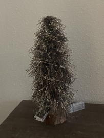 kerstboom van houten takken met goud