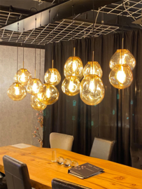 Hanglamp Din ei, 12 lichts met amber glas