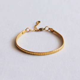 Stalen platte armband gestreept goud