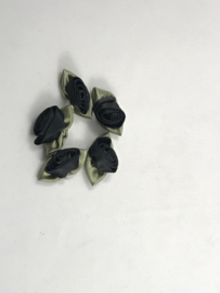 losse bloemtjes groot   zwart met  groen blaadje € 1,95