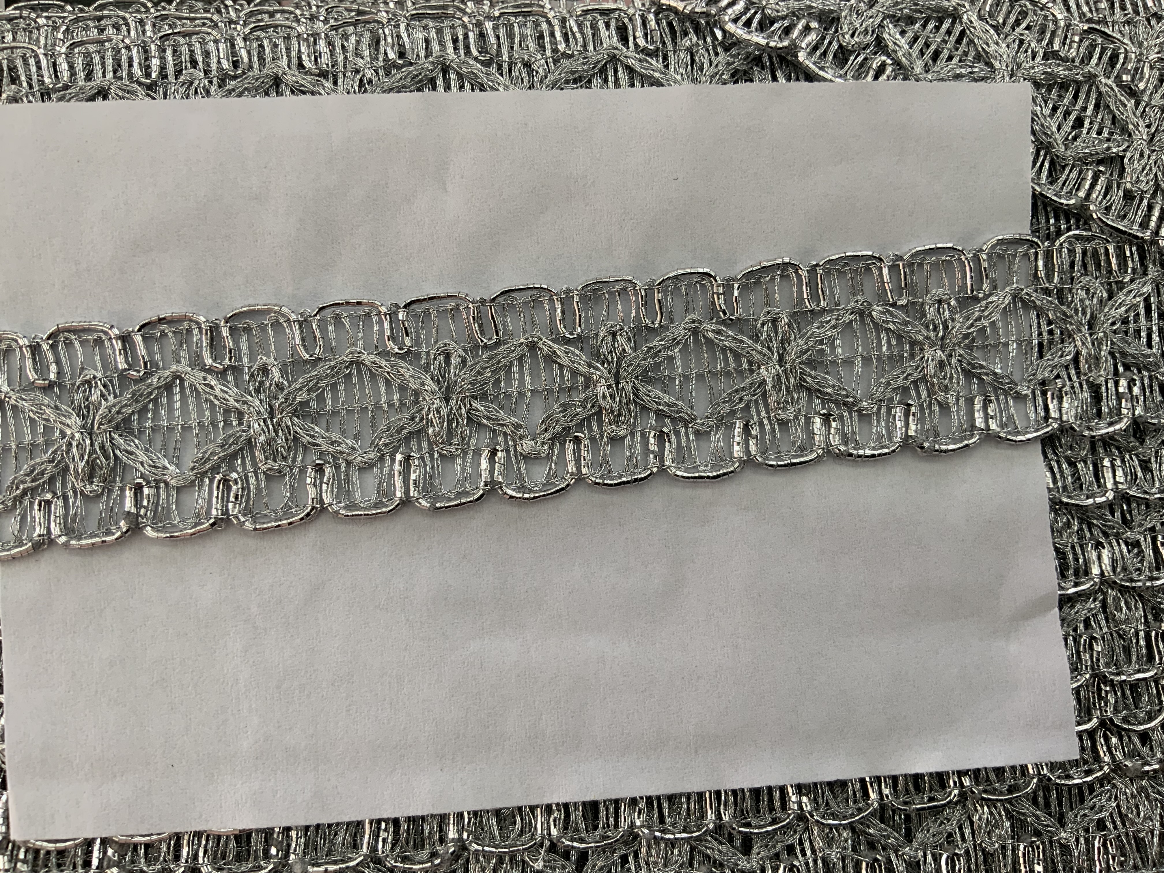 Zilver galon 20 mm breed   €1,50