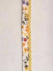biaisband met geel kantje  met bloemetje  geel/rood/oranje  €1,75 per meter