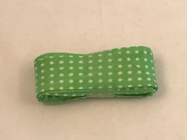 Biais band katoen bedrukt lime  met kleine witte stipjes