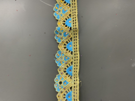 Turquois met goud randje en steentjes  € 5,95 per meter