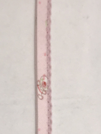 biaisband met licht roze kantje  met licht roze met figuurtjes  €1,75 per meter