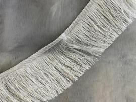 Franje wolwit dun. 10 cm lang    € 2,25 per meter