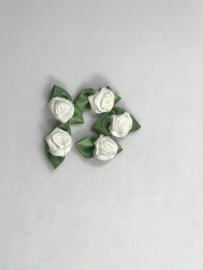 losse bloemtjes groot   wit  met  groen blaadje € 1,95