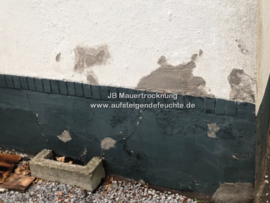 Putz löst sich (Außenwand)