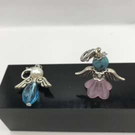 mini blauw met witte engel