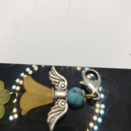 mini geel met blauwe engel