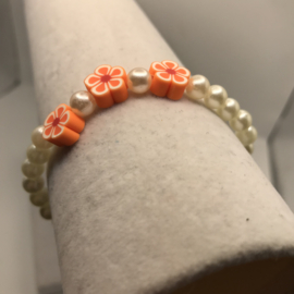 vrolijke parels met bloemen armband