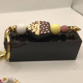gouden cupcake sleutelhanger