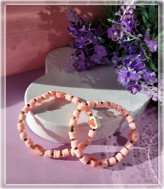 roze heishi kralen armband