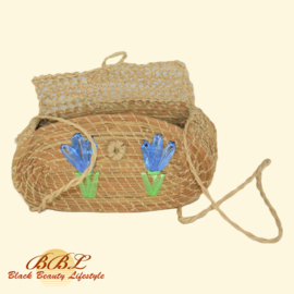 Braided handbag with flower decoration