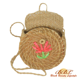 Round braided handbag with flower decoration