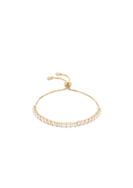 Golden tennis bracelet