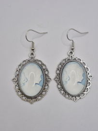 Oorbellen met afbeelding achter glas