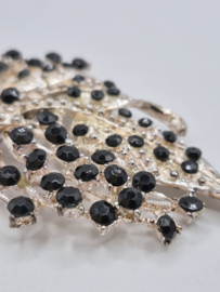 Vintage broche met steentjes