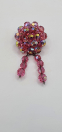 Broche met roze glaskraaltjes