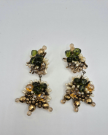 Uitbundige vintage oorstekers