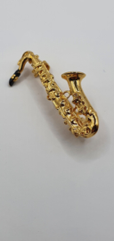 Goudkleurige broche saxofoon VERKOCHT