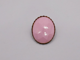 Broche met roze steen