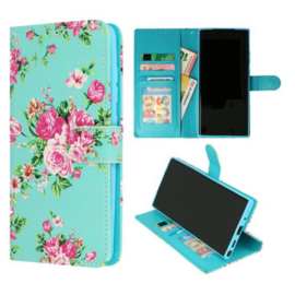 Book Case Geschikt voor iPhone 16e / iPhone 17e - Bloemen Printje - Ruimte voor 3 pasjes