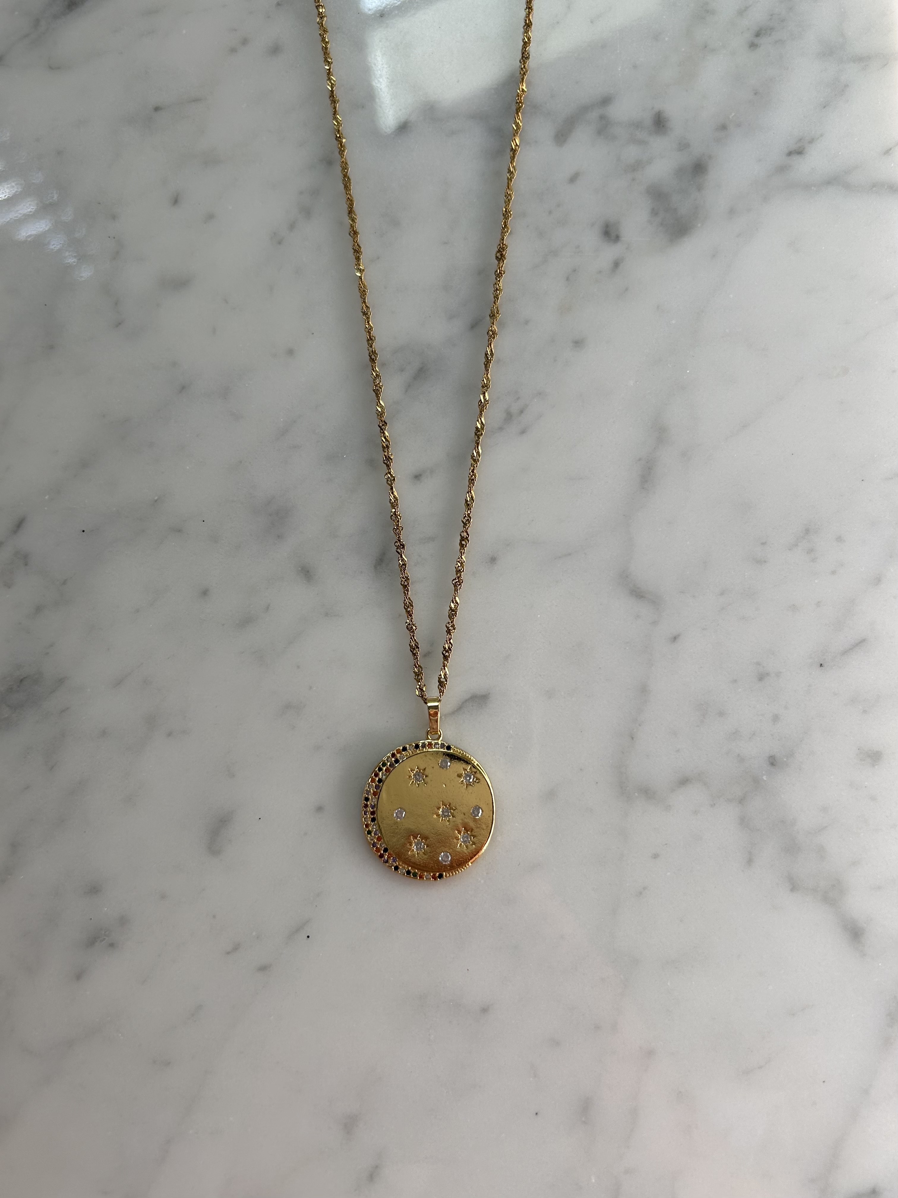 Golden colorful moon coin