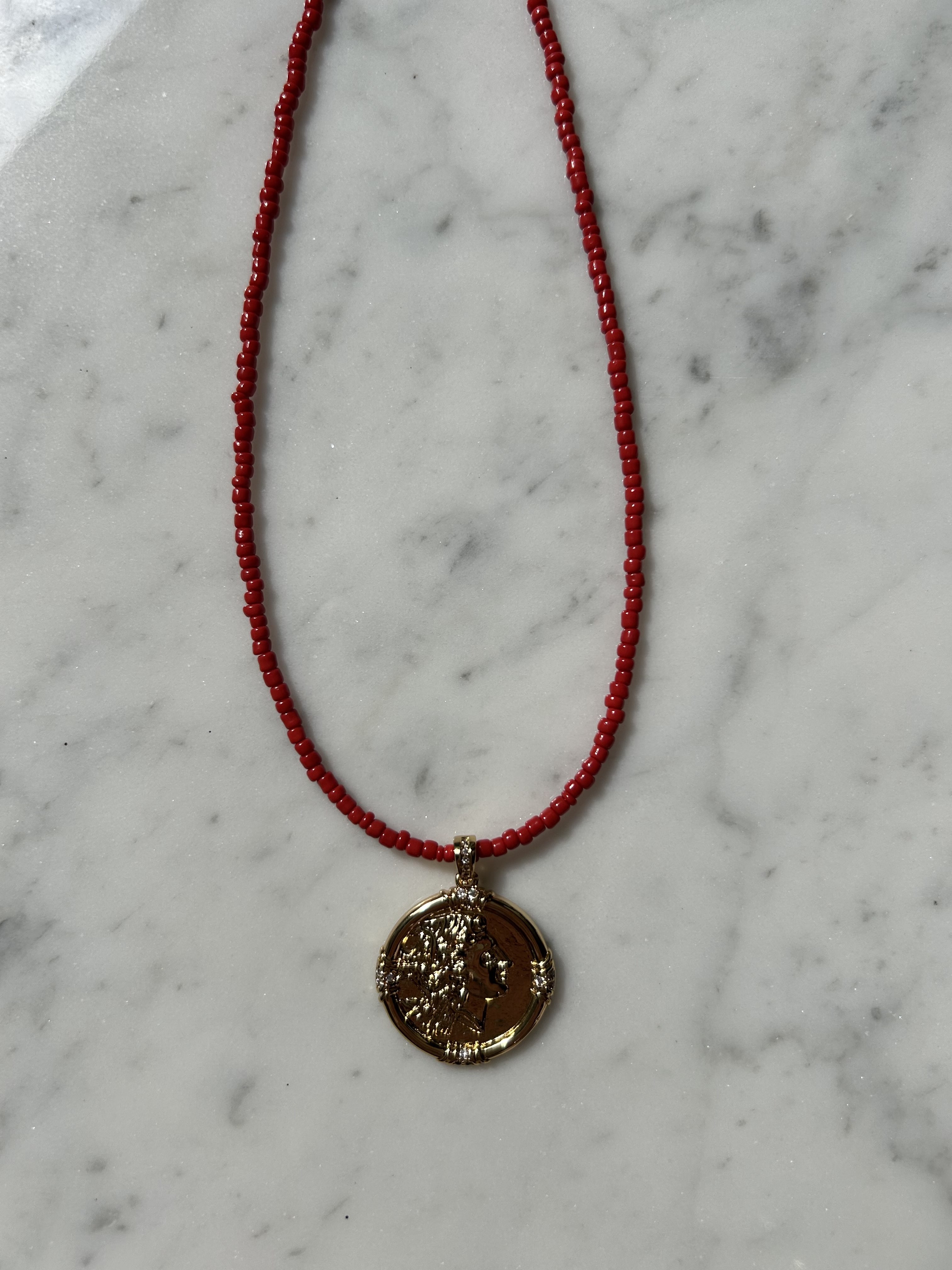 Golden red coin