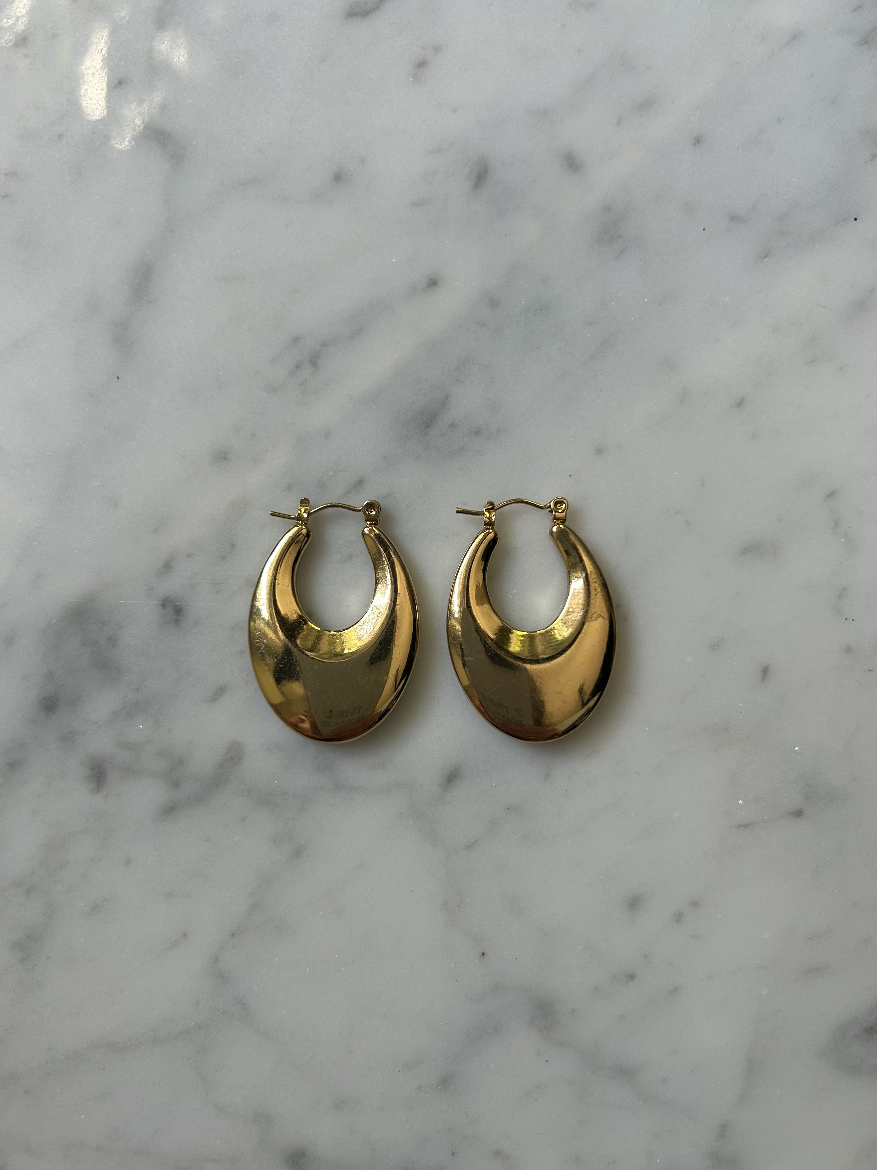 Golden oval vintage hoops