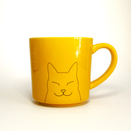 Koffiemok geel met ‘Witte Kat’.