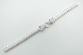 Zilveren panter koppen bracelet met zirkonia steentjes en groene ogen.